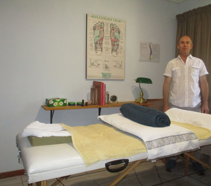 A woman enjoying a relaxing back massage in a spa setting, promoting wellness and relaxation.
